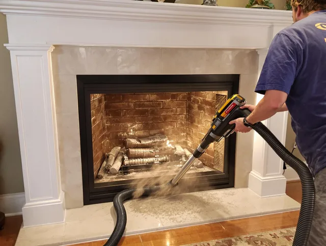 Fireplace cleaning performed by Littleton Chimney Sweep in Littleton, MA